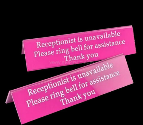 Custom acrylic sign on lobbies reception desks